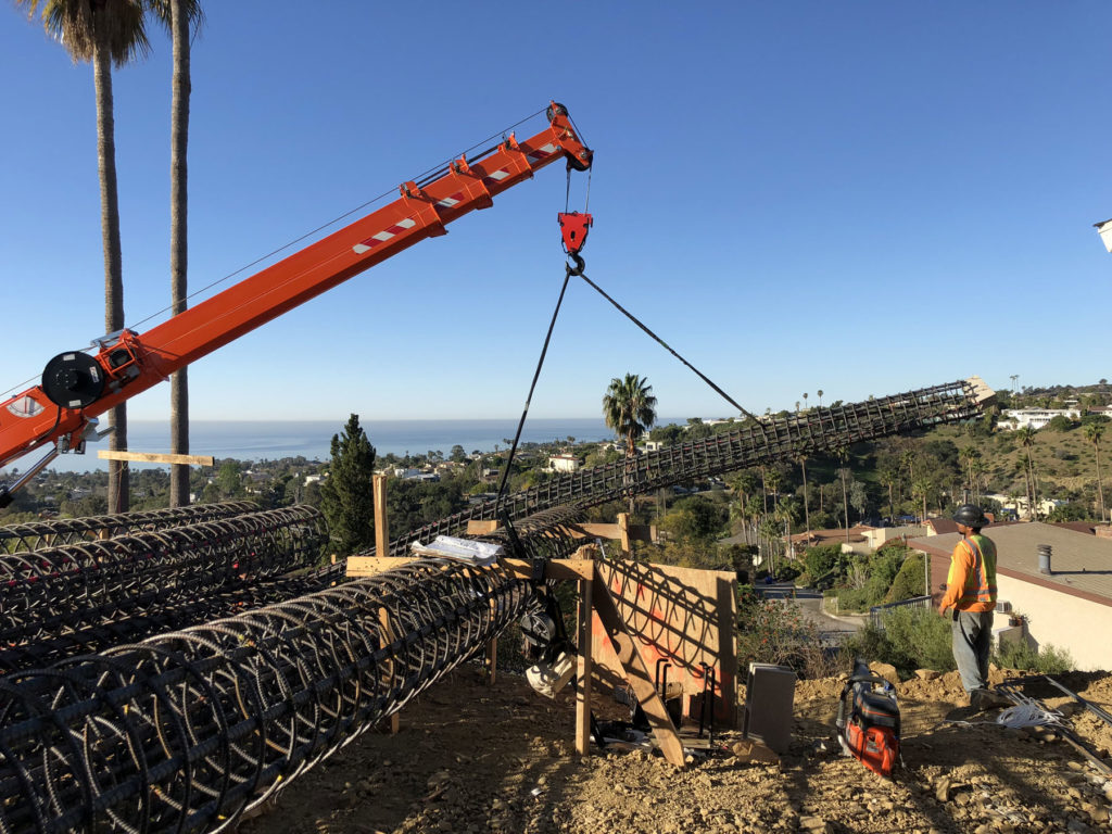 Cranes and Heavy Equipment need for hillside contruction in Los Canoas