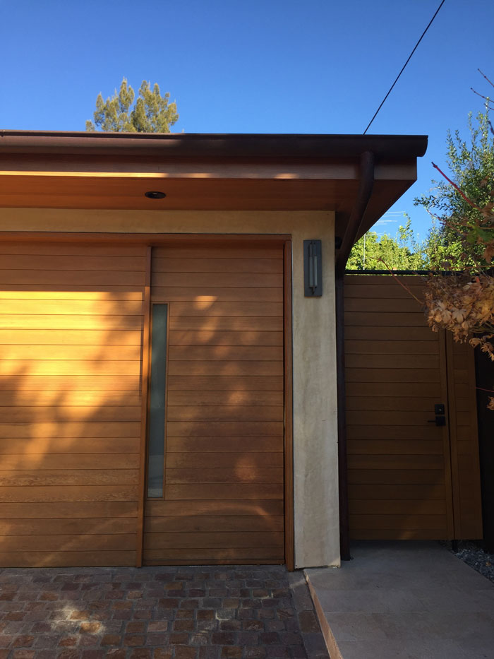 Fold-up garage style doors with modern wood design