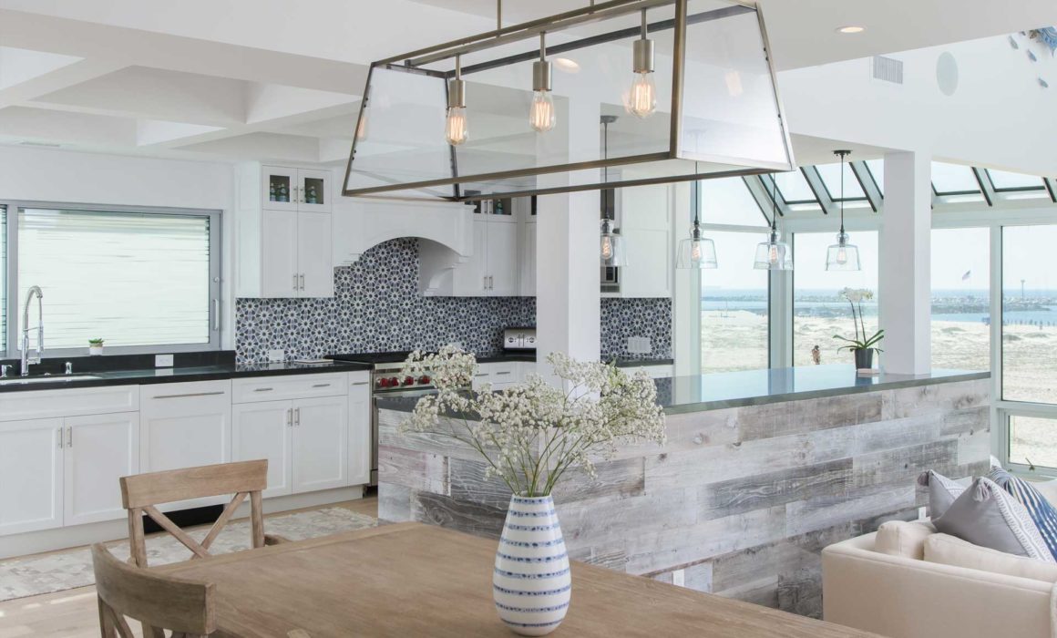 Rustic touches add warmth to modern coastal kitchen design in California