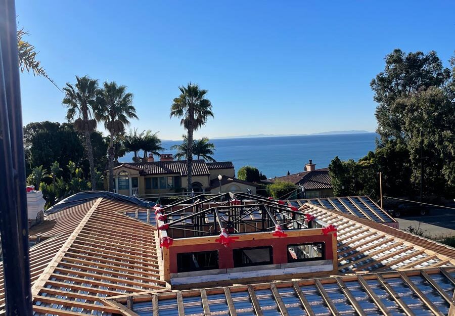 Amazing ocean views for second story addition overlooking new roof framing and center atrium with steel framing